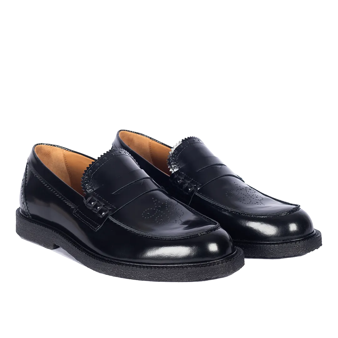 Penny loafer with decorative brogue pattern
