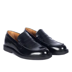 Penny loafer with decorative brogue pattern